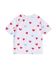 Camiseta con estampado de corazones desteñidos